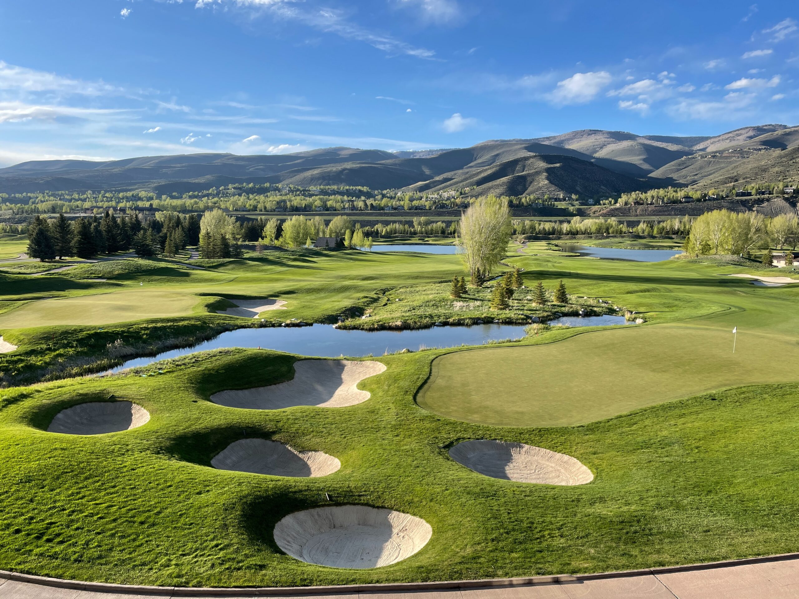 Arial view of a golf course with several bunkers